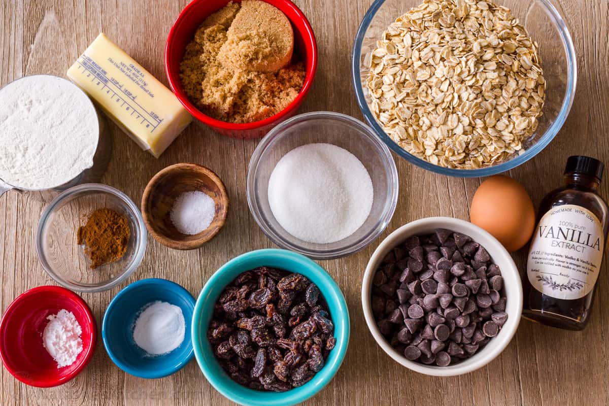 Ingredients for making oatmeal chocolate chip cookies with raisins