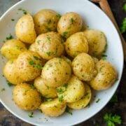 Easy boiled potatoes served in white bowl
