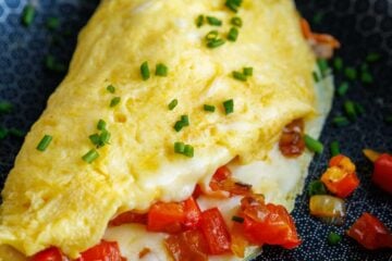 egg omelette in a blue dish for breakfast ideas