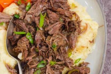 Mississippi Pot Roast served over mashed potatoes