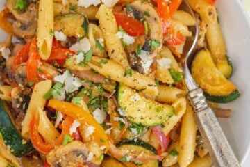 Pasta Primavera garnished with parmesan cheese