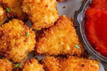 Popcorn Chicken served with ketchup