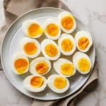 Boiled eggs on a platter with soft boiled eggs and hard boiled eggs