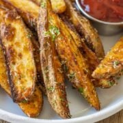 Baked potato wedges served with dip