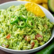 spicy guacamole served with tortilla chips