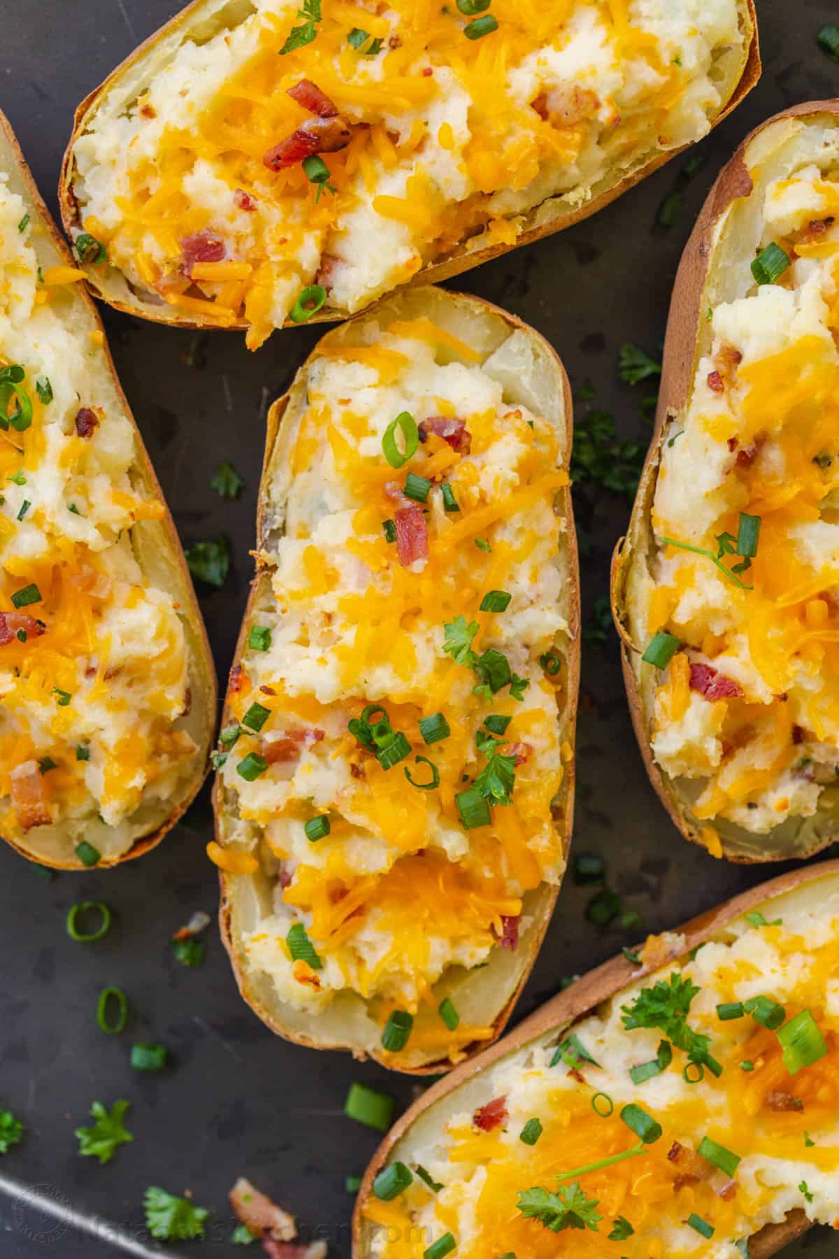 Baked Stuffed Potatoes garnished