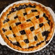 Blueberry Pie Recipe surrounded by blueberries