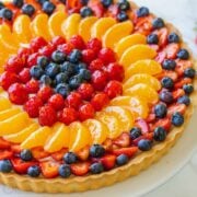 Whole fruit tart on platter