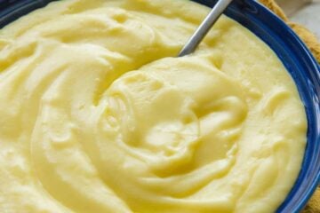 Large bowl of pastry cream with spoon