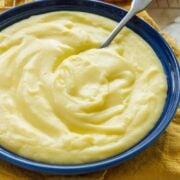 Large bowl of pastry cream with spoon