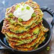 zucchini fritters served with sour cream