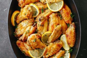 Lemon Pepper wings served with lemon wedges