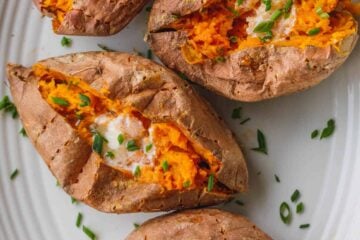 Baked sweet potatoes on serving platter
