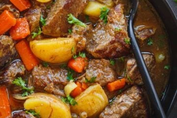 Slow cooker beef stew served in a bowl