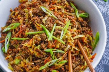 Egg Roll in a Bowl served with green onion and chopsticks