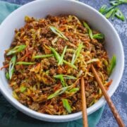 Egg Roll in a Bowl served with green onion and chopsticks