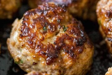 juicy pork and beef meatballs in pan