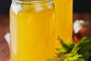 Turkey bone broth made from roasted Thanksgiving turkey and stored in glass jars