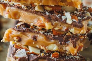 Toffee candy stacked up high with almonds and chocolate