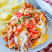 Monterey Chicken is topped with melted Monterey jack cheese, tomatoes, crispy bacon, and chives. Serve this Chili's copycat meal with creamy mashed potatoes right in the comfort of your own home.