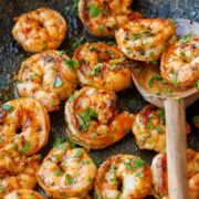 Cilantro Lime Shrimp recipe in a pan with a wooden spoon