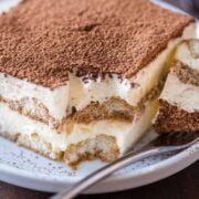 Slice of Italian Tiramisu cake on a plate