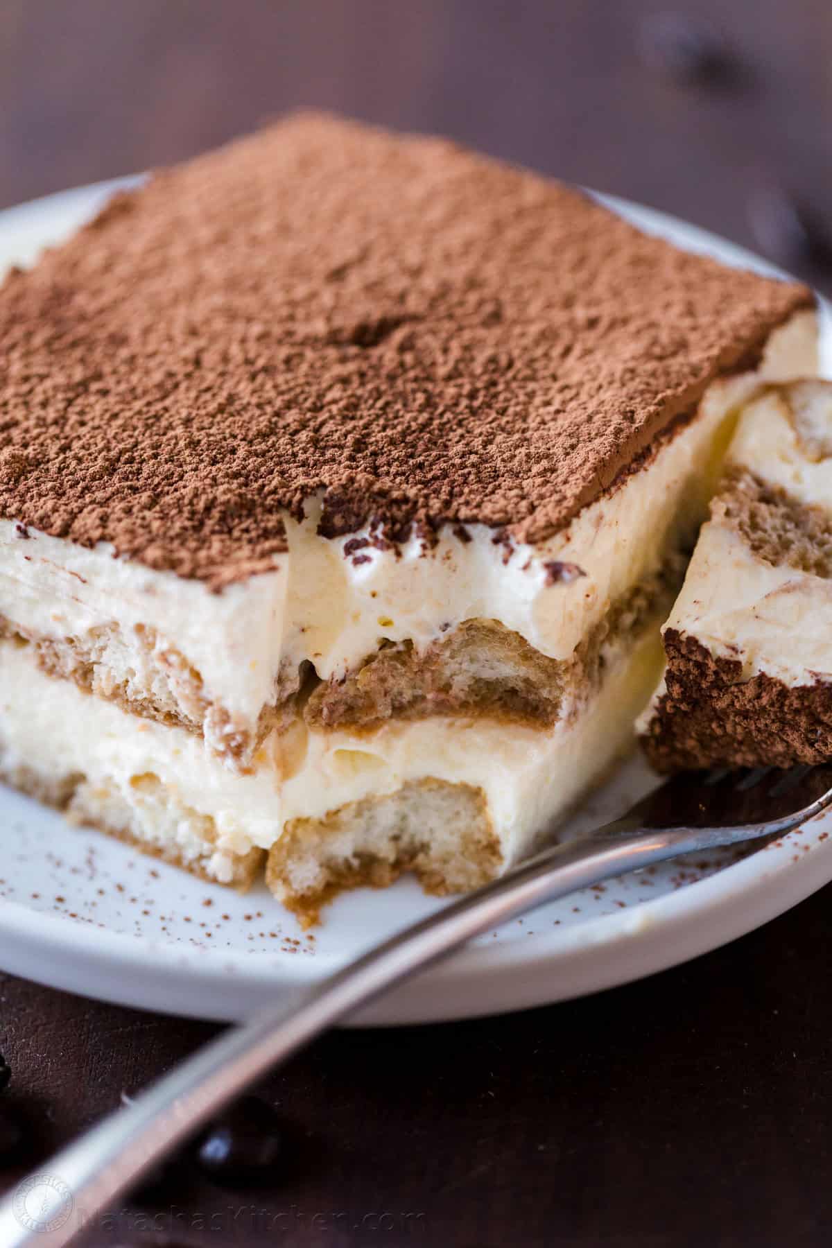 https://natashaskitchen.com/wp-content/uploads/2024/05/Tiramisu-Cake-Recipe-2.jpg?utm_source=chatgpt.com