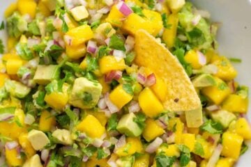 Mango salsa served with a tortilla chip