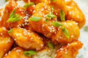 Honey Garlic Chicken Served over a bed of white rice