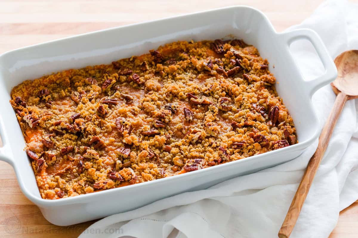 The best Sweet Potato Casserole made ahead in a white casserole dish.