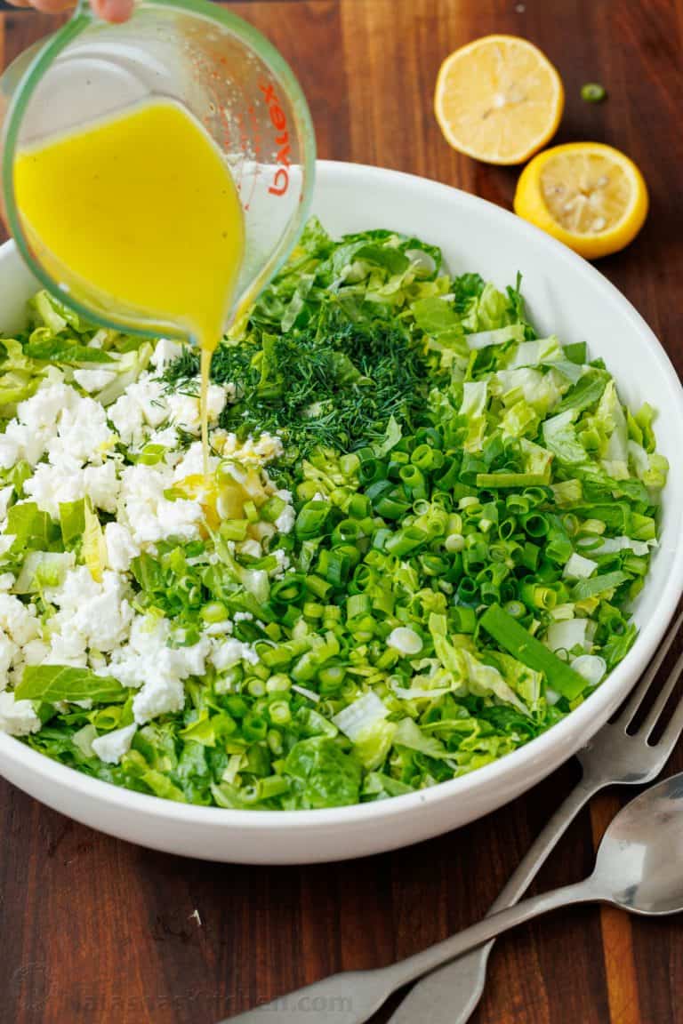 How to drizzle maroulosalata dressing over greens