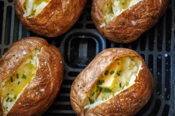 Air Fryer Baked Potatoes in the air fryer basket