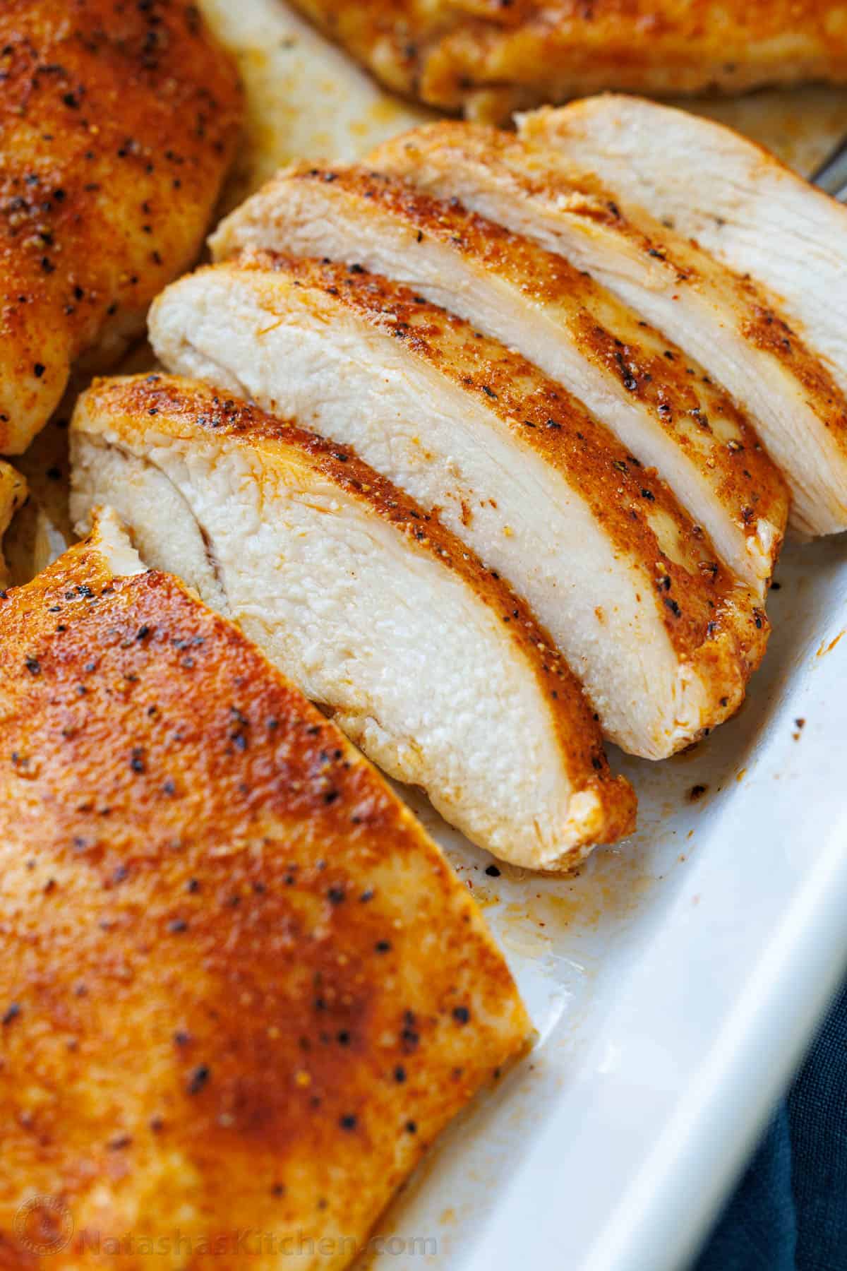 Juicy Baked chicken breast sliced into strips
