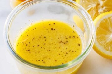Lemon vinaigrette dressing in glass jar