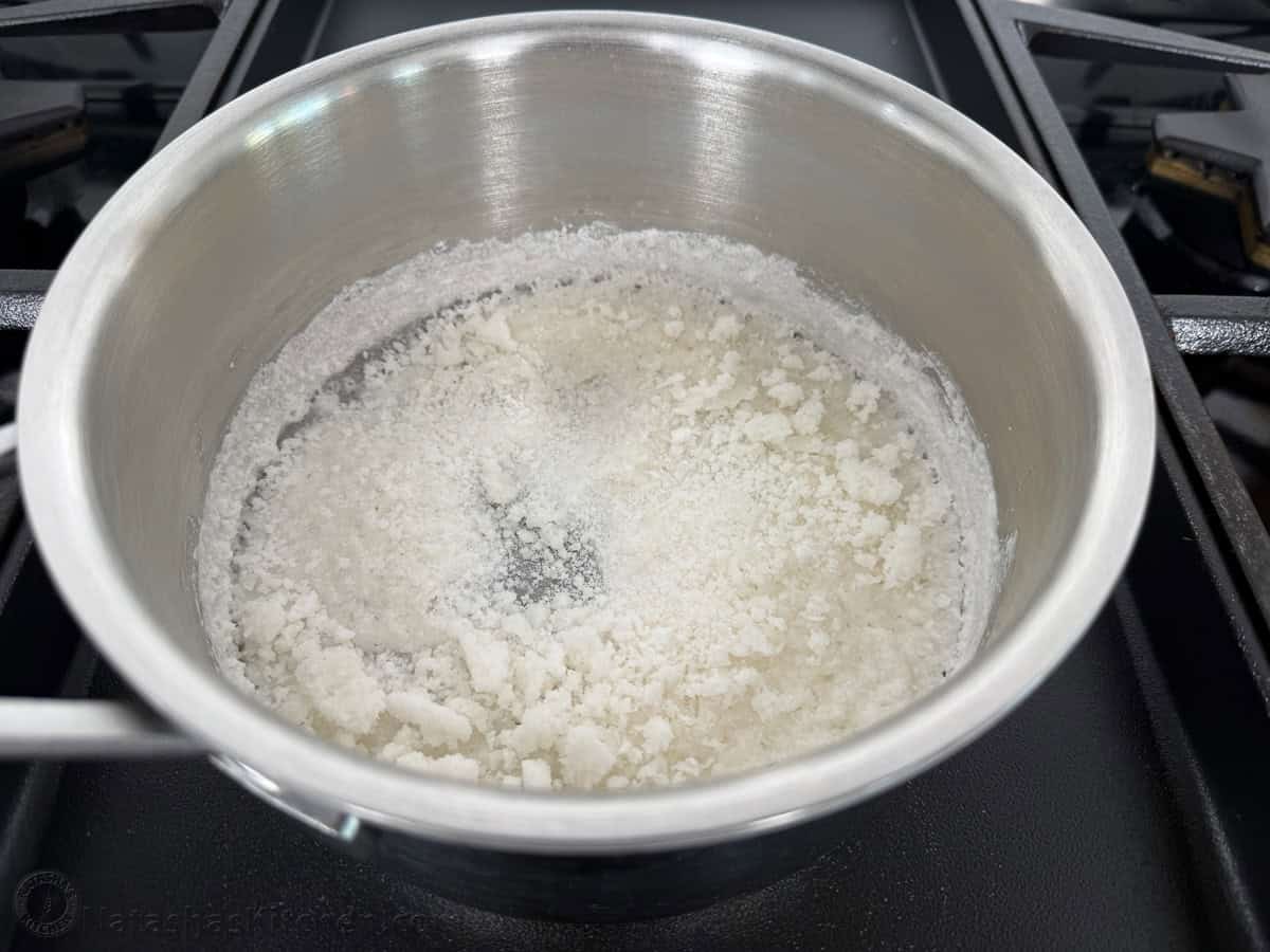 photo of crystalized sugar and water in a saucepan