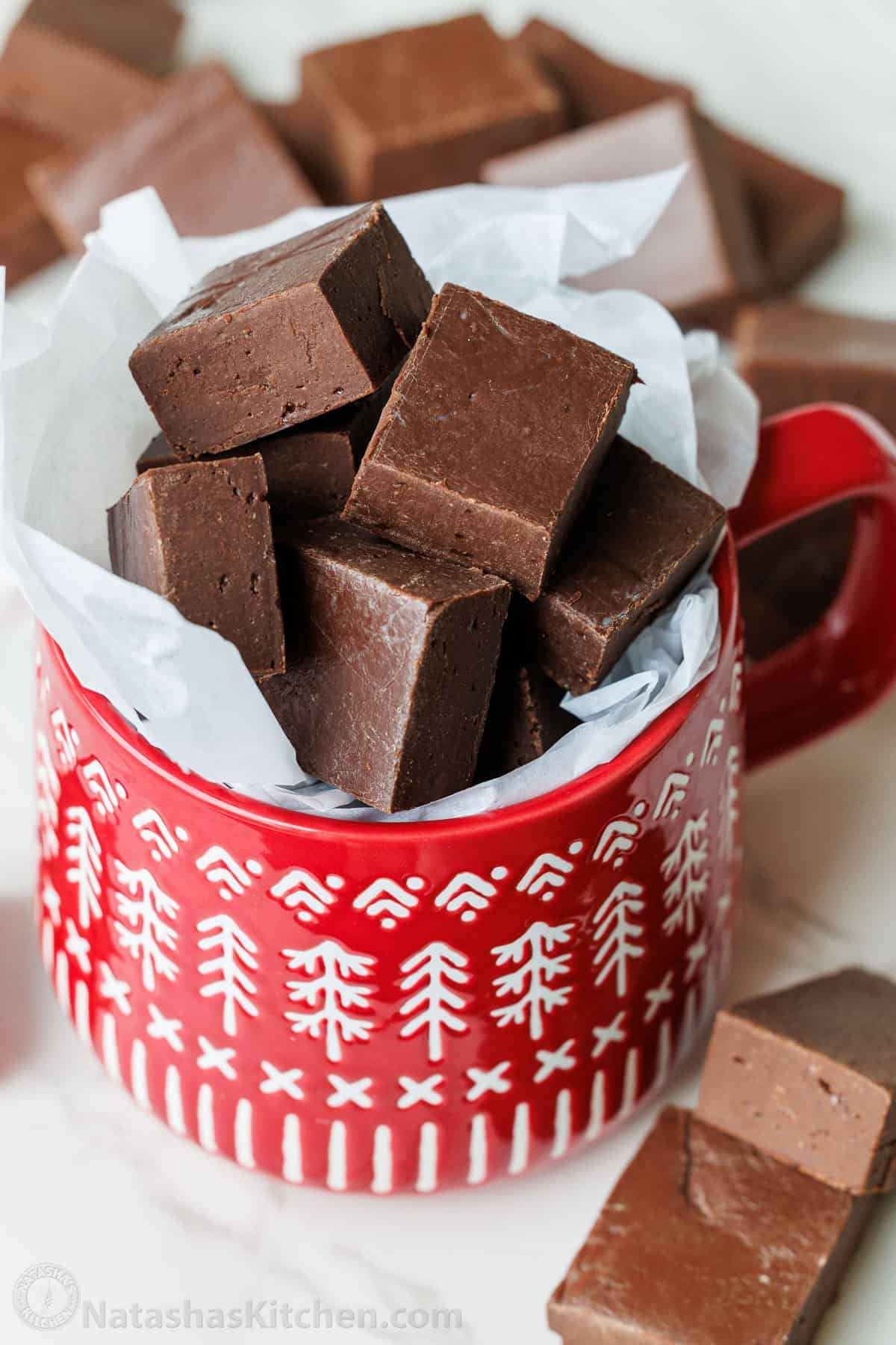 Homemade treat recipe in a red Christmas cup