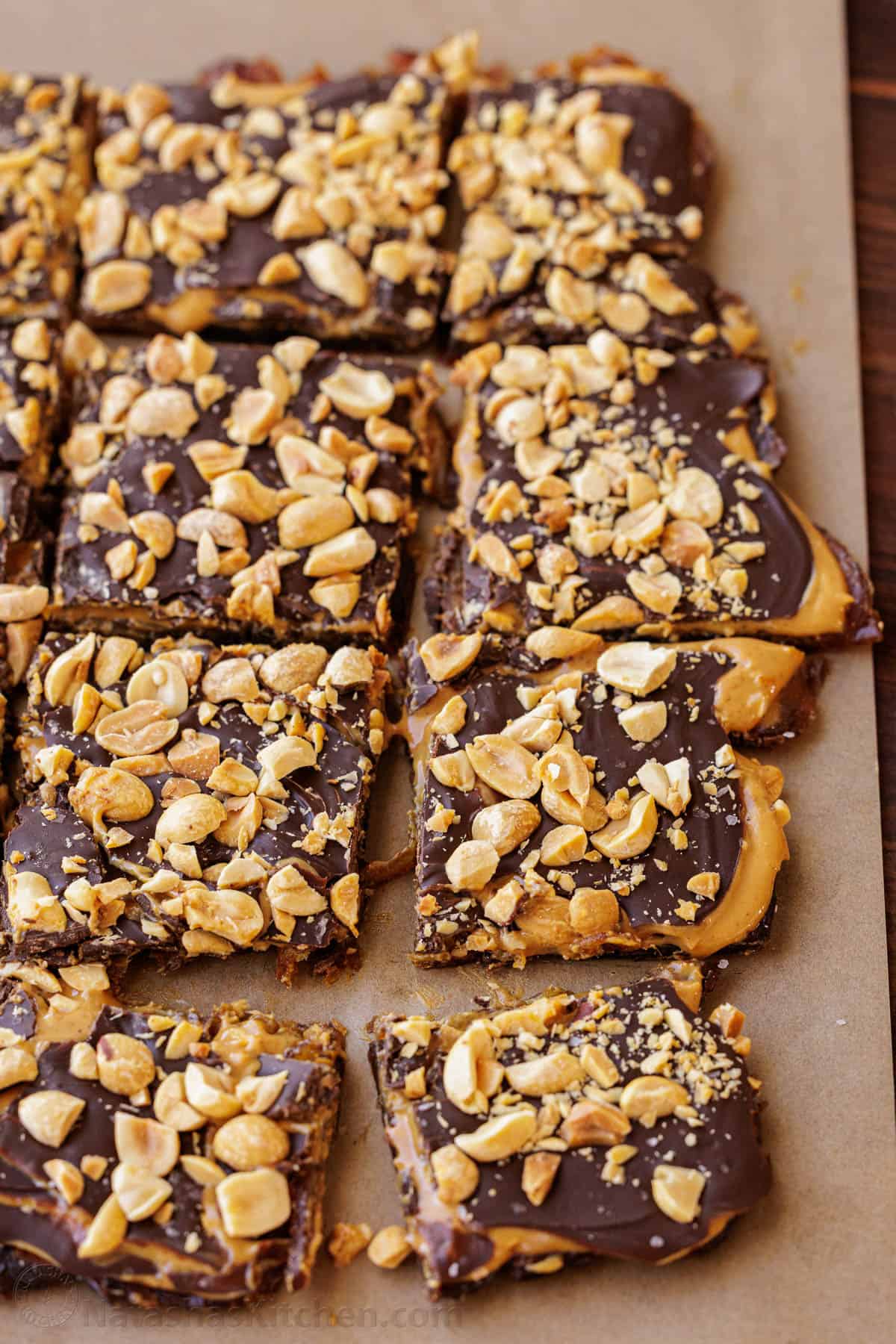 Date snickers bars on parchment paper