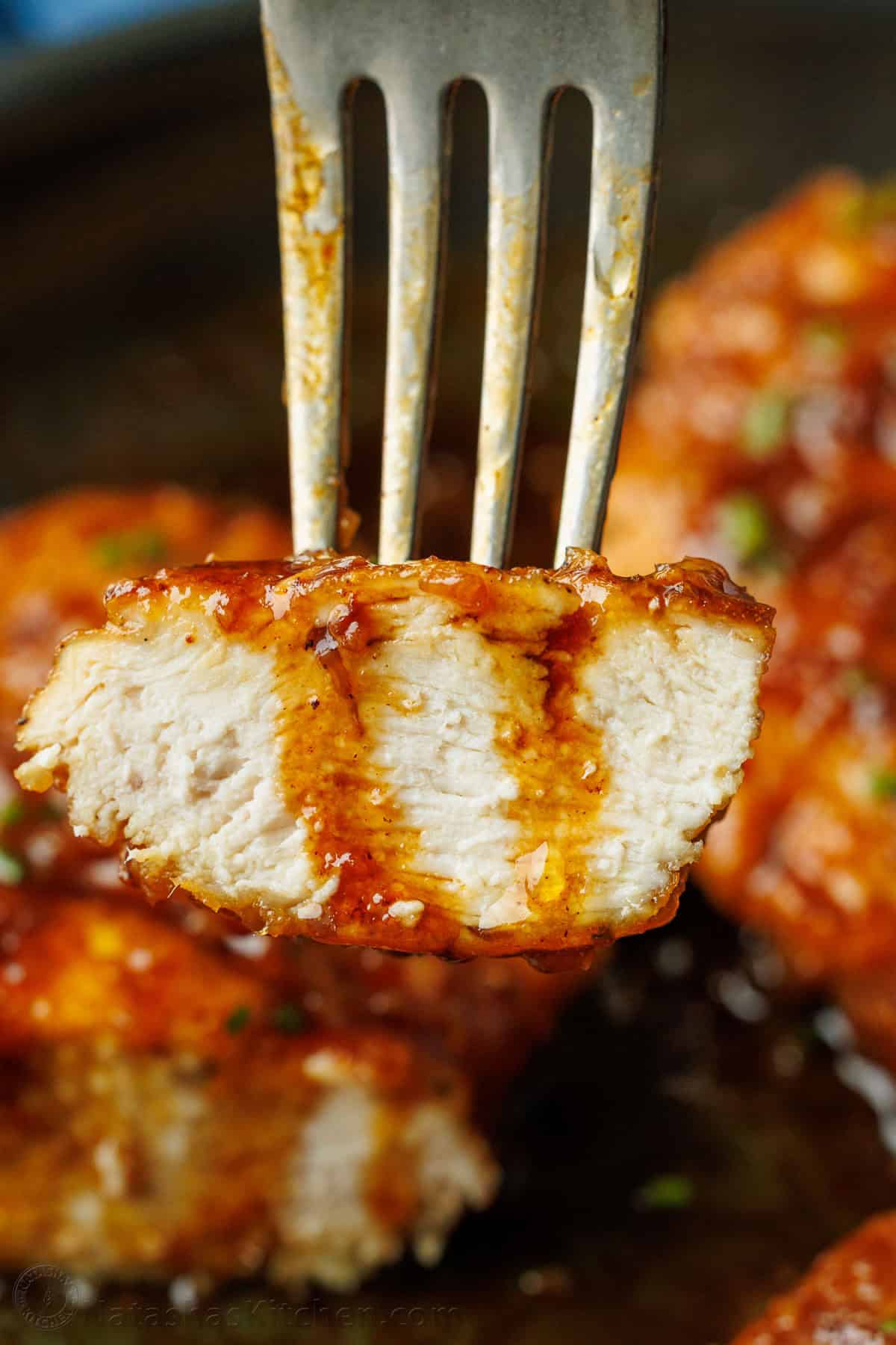 Perfectly cooked piece of honey chicken with glaze