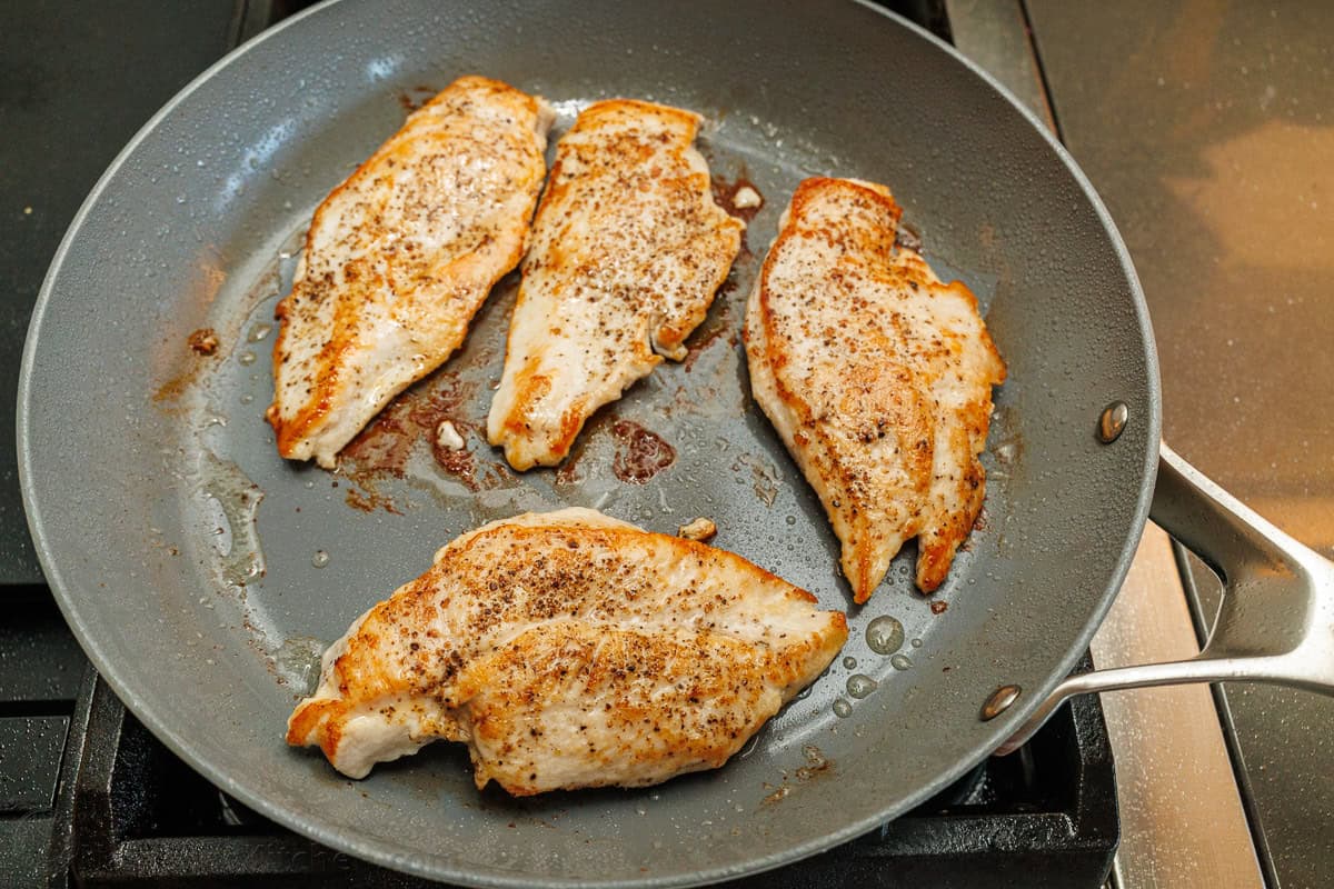 4 chicken breasts in a non-stick skillet