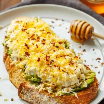 High protein avocado toast with egg and cottage cheese on sourdough bread