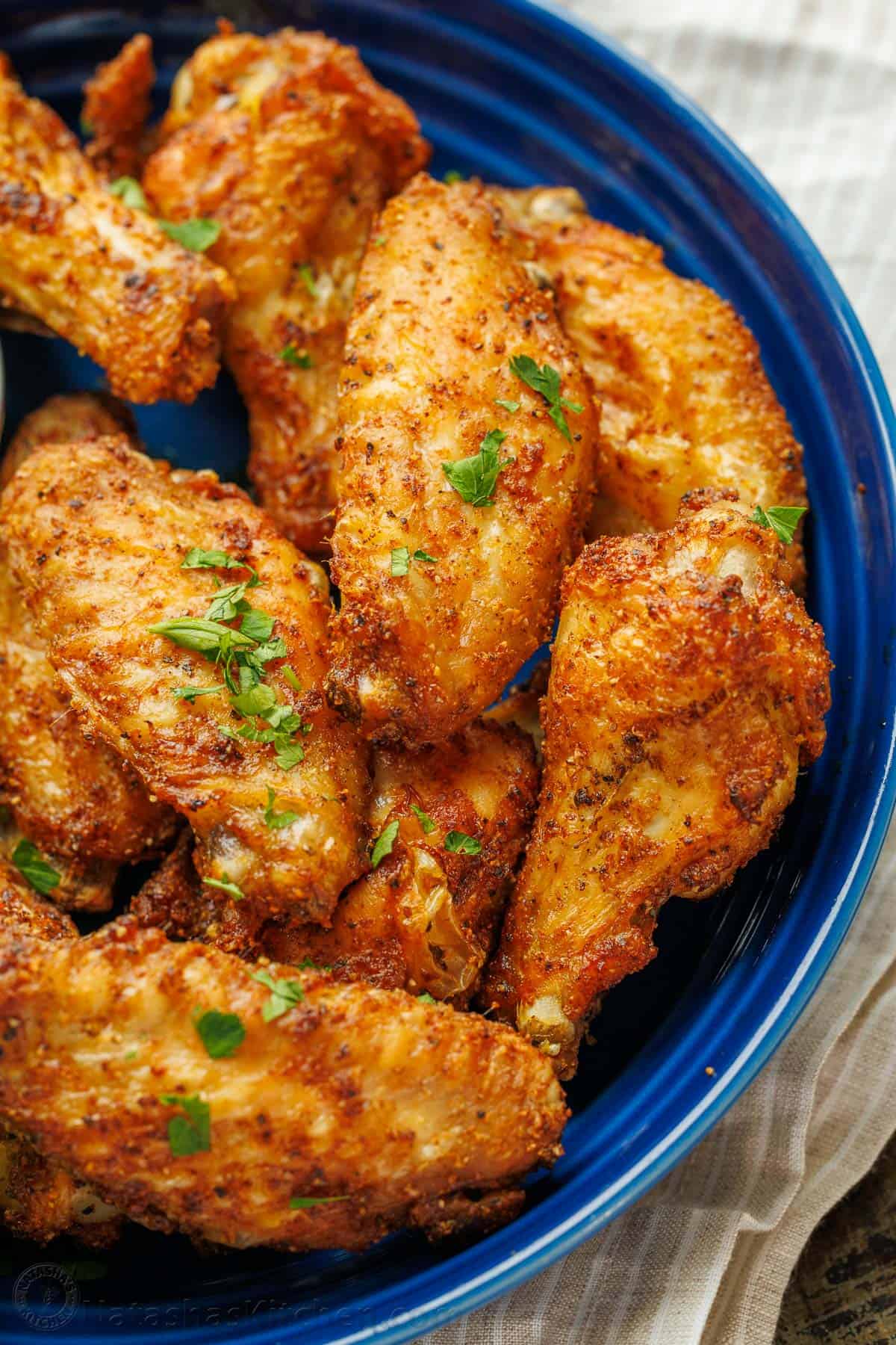 Up close crispy seasoned air fryer wings