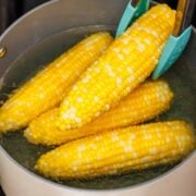 4 boiled corn on the cob removed from large stock pot