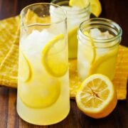 Homemade Lemonade served in pitcher with glasses of lemonade