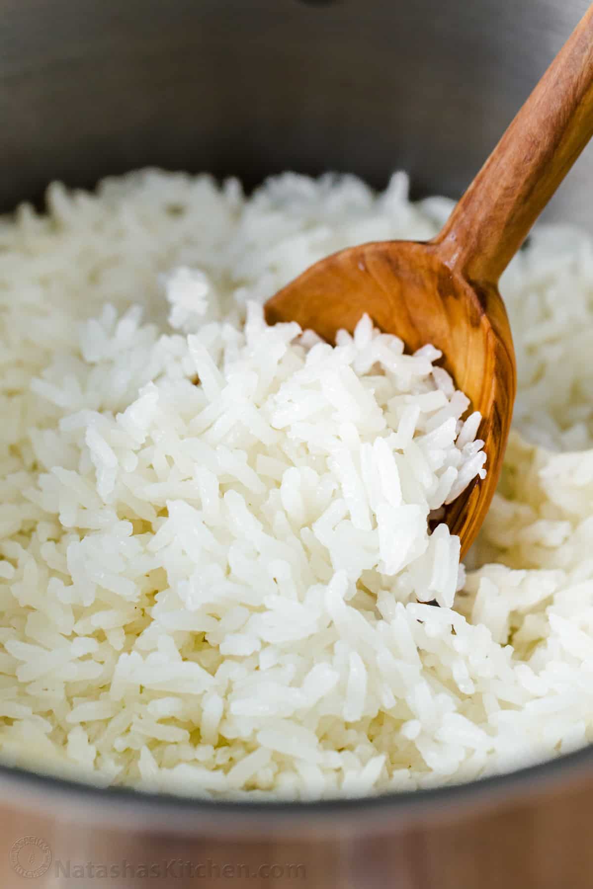 How to cook rice perfectly every time with the best rice-to-water ratio and a foolproof stovetop method for fluffy white rice. Get the recipe! Up close fluffy grains of perfectly cooked white rice.