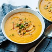 Roasted Butternut Squash Soup in a bowl garnished with pumpkin seeds