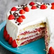 Strawberry Cake with slice removed to show cake layers
