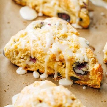 Blueberry scones drizzled with lemon glaze