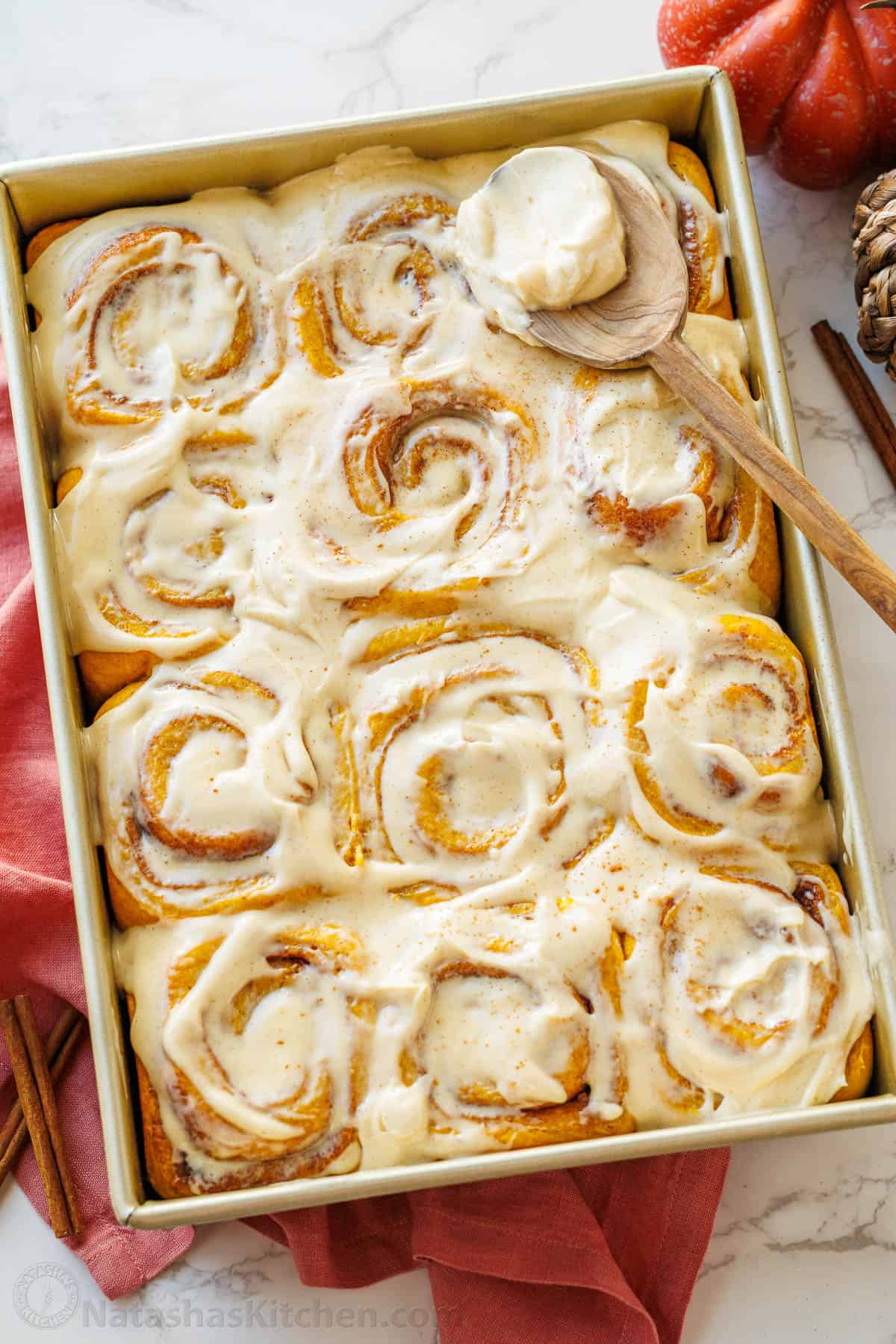 Rectangle pan with iced baked dessert covered in frosting