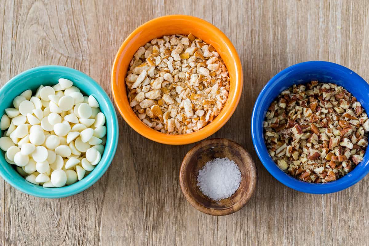 Homemade Caramel Apples are such a fun treat for Fall. This caramel apple recipe is so easy with only 3 ingredients for the caramel dip. Toppings for caramel apples