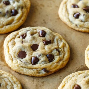 Soft and chewy homemade chocolate chip cookies on a baking sheet